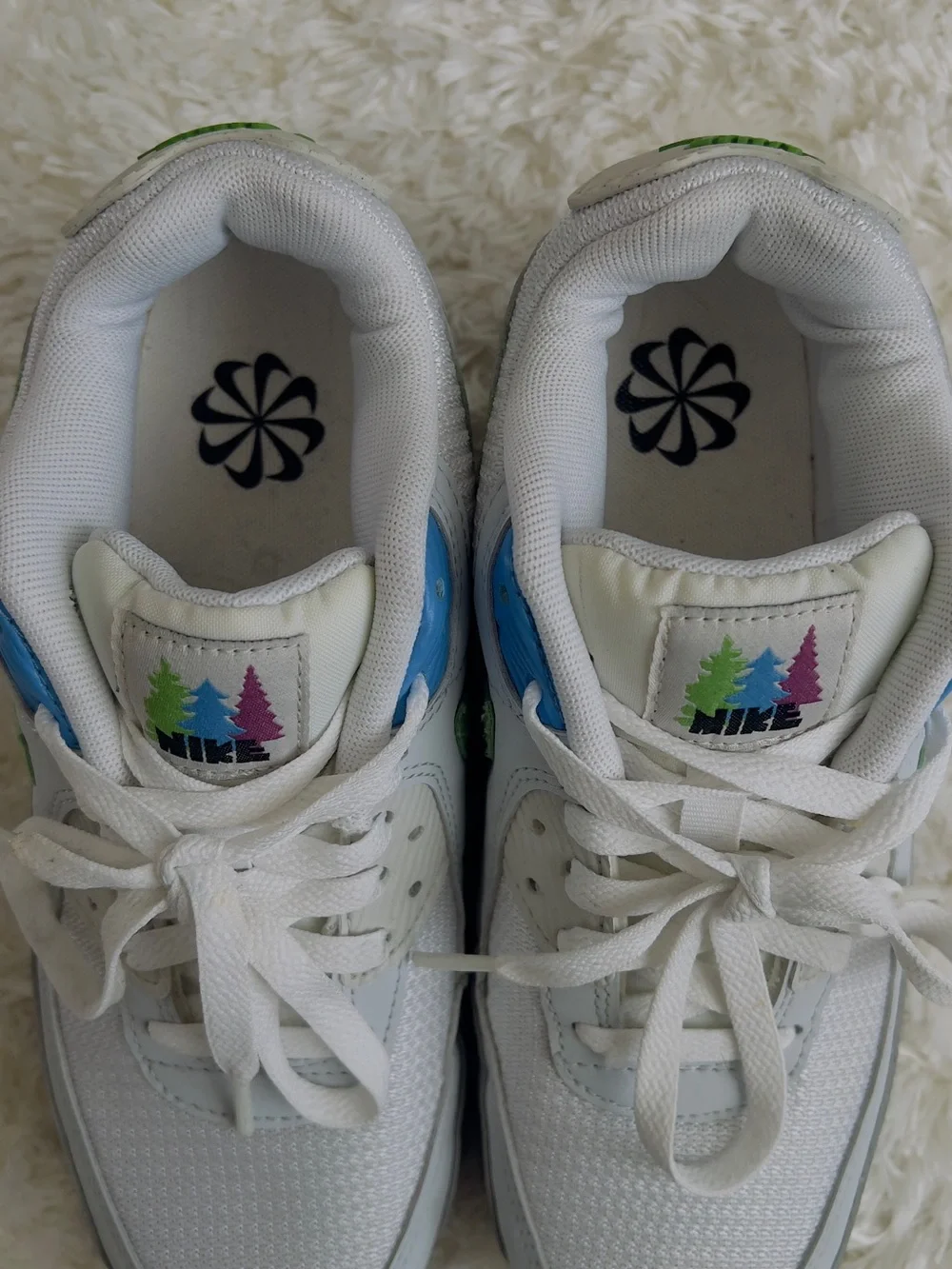 Nike Air Max 90 sneakers in white with blue and green accents